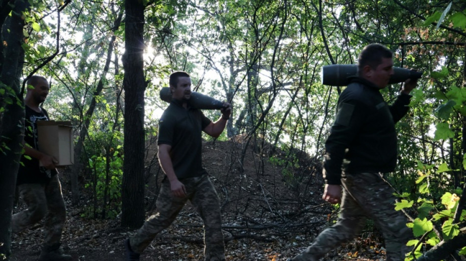 Russia kills 21 in east Ukraine during pension distribution, Zelensky says