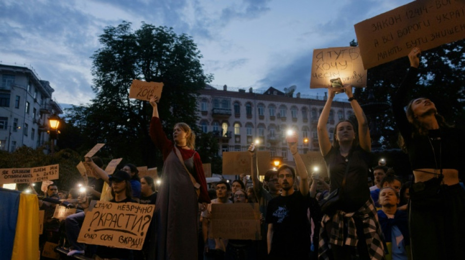 Thousands protest in Kyiv against law curbing anti-graft agencies