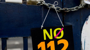 Thailand revokes visa of US academic charged with royal insult 