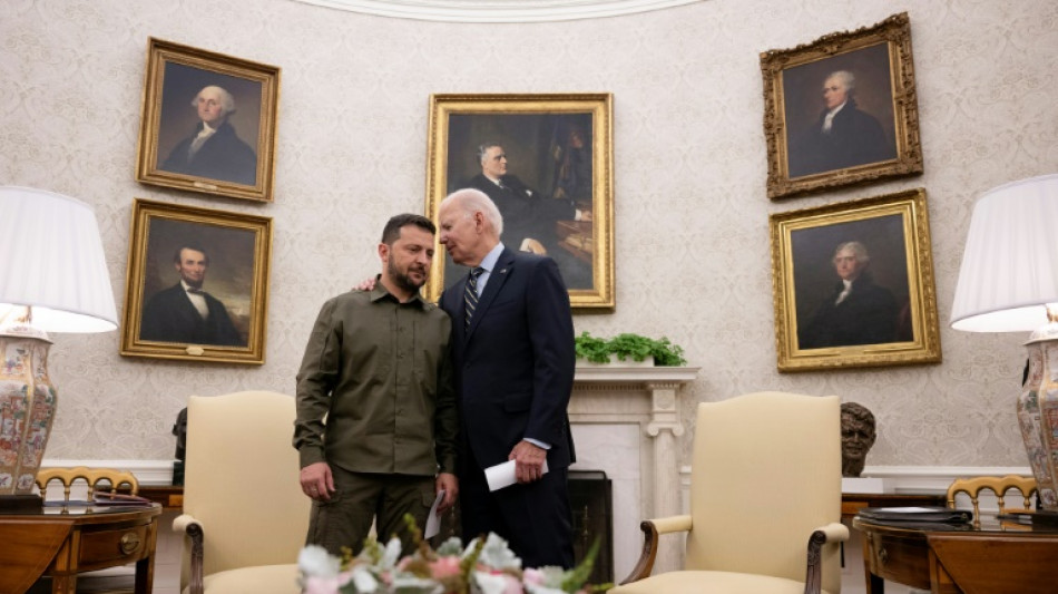 Zelensky wins Biden support vow but faces US skeptics