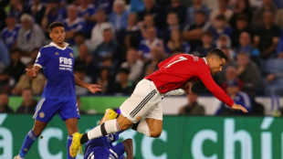Angleterre: Manchester United r&eacute;ussit la passe de trois