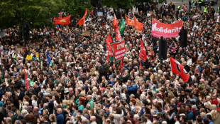 Thousands turn out for anti-racism rally after Belfast unrest