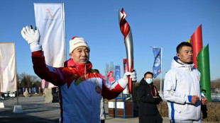 JO-2022: le relais de la flamme olympique d&eacute;marre &agrave; P&eacute;kin