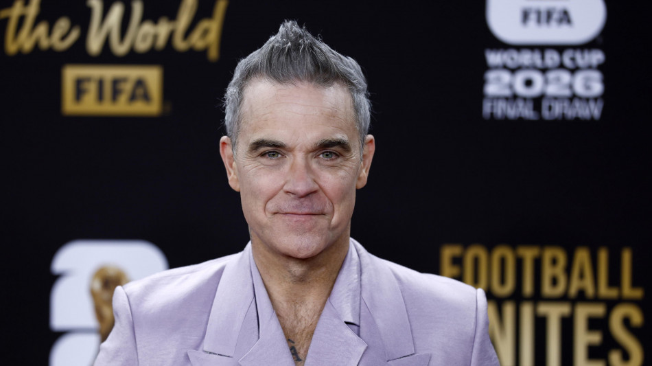 Robbie Williams da record, supera i Beatles per numero di album al primo posto