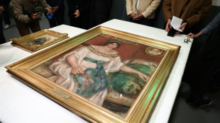 Stolen Renoir paintings found behind wall in France