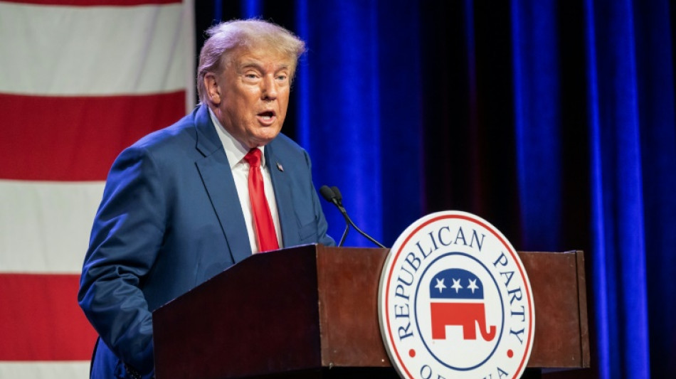 Trump, defiant over legal woes, shares Iowa stage with DeSantis