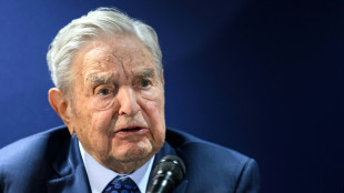 Trump urges criminal charges against George Soros, son