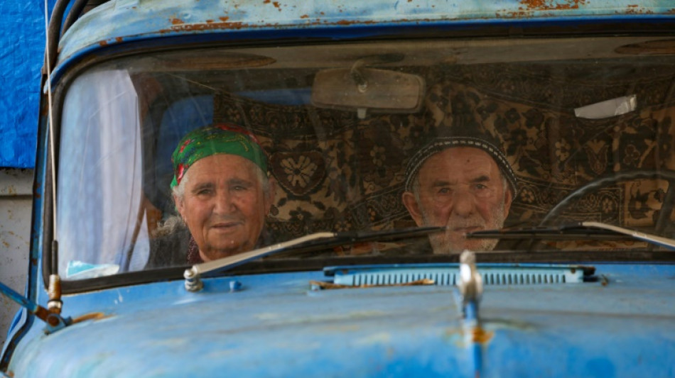 Azerbaijan seeks 'war crime' suspects in sea of Karabakh refugees