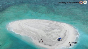 Philippines denies 'irresponsible' Chinese report on disputed reef